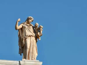 Ancient Greek sculpture depicting a powerful mythological figure