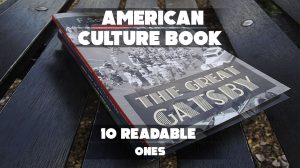 A creative social cover featuring a stack of books with American cultural icons like the Statue of Liberty, a baseball, and a bustling city backdrop.