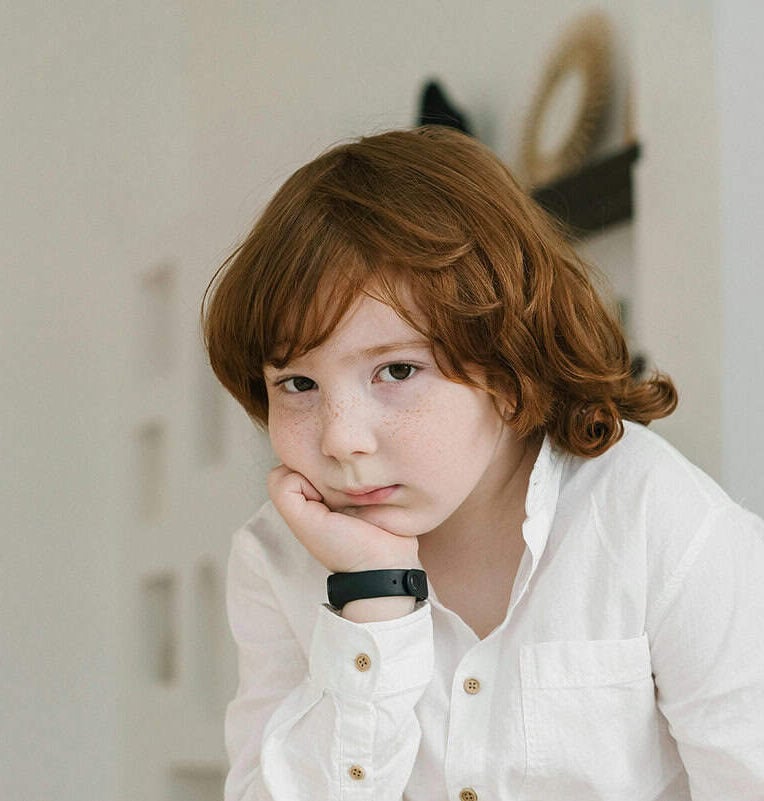 A young Lithuanian boy with a bright expression, dressed in casual attire. A young Lithuanian boy with a bright expression, dressed in casual attire.