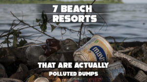 Polluted beach with trash on sand and cloudy skies.