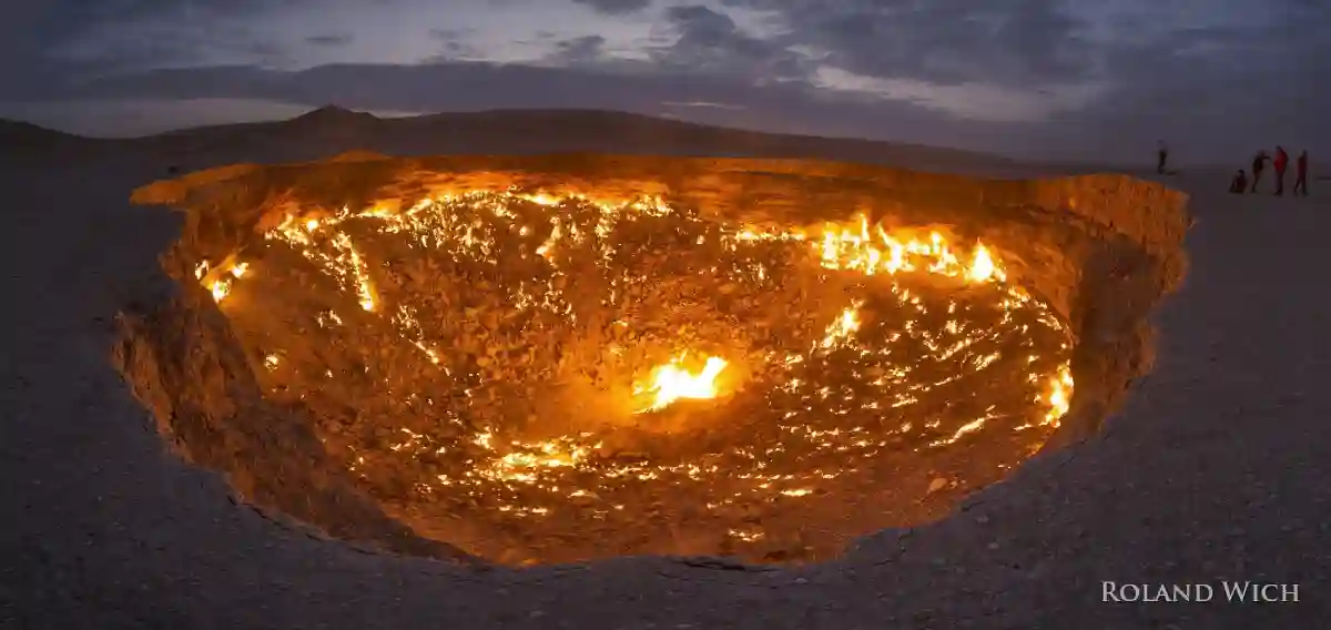 Darvaza / Derweze burning gas crater. While drilling for gas in 1971, the rig collapsed, forming a crater with gas leaking from sources underneath. Darvaza / Derweze burning gas crater.
While drilling for gas in 1971, the rig collapsed, forming a crater with gas leaking from sources underneath.