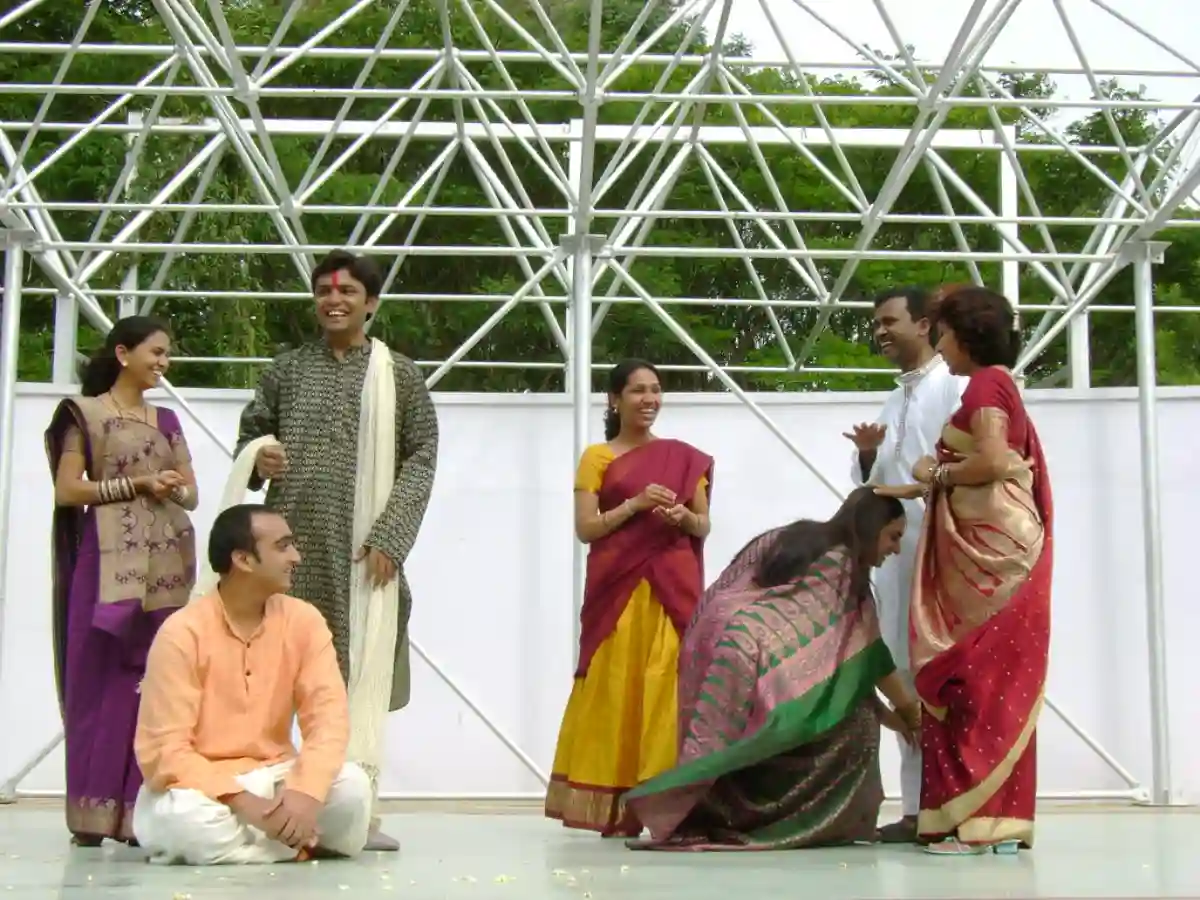 The bride and groom receive blessings from their elders during the Aashirwad ceremony, a traditional Bengali wedding ritual. The bride and groom receive blessings from their elders during the Aashirwad ceremony, a traditional Bengali wedding ritual.