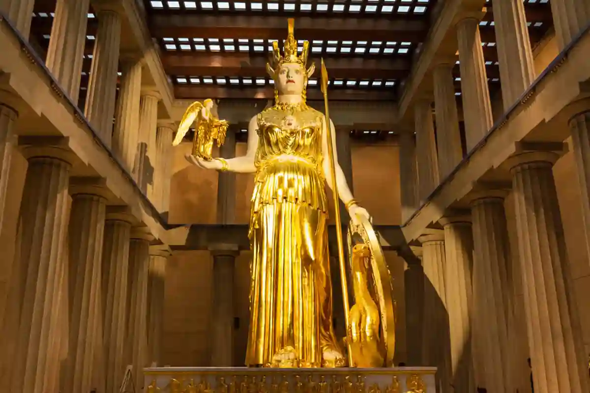 Athena, Goddess of Victory, dressed in ancient Greek armor with a helmet and spear, embodying wisdom, strength, and the triumph of strategy in Greek mythology. Athena, Goddess of Victory, dressed in ancient Greek armor with a helmet and spear, embodying wisdom, strength, and the triumph of strategy in Greek mythology.
