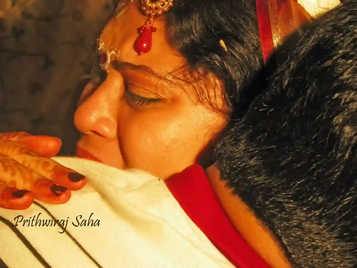 The bride bids farewell to her family during the Bidaai ceremony, a heartfelt moment marking her departure from her parental home. The bride bids farewell to her family during the Bidaai ceremony, a heartfelt moment marking her departure from her parental home.
