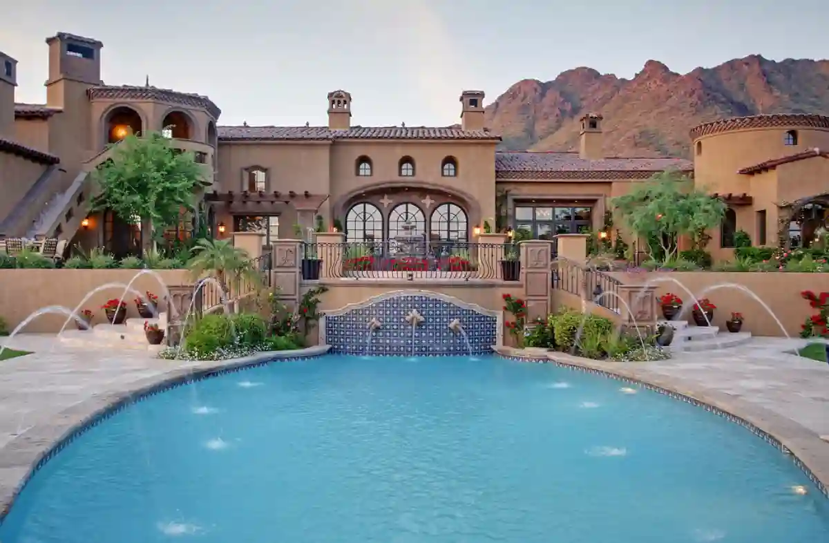 A luxurious Italian villa showcasing refined architecture, sprawling gardens, and breathtaking views of the surrounding landscape. A luxurious Italian villa showcasing refined architecture, sprawling gardens, and breathtaking views of the surrounding landscape.