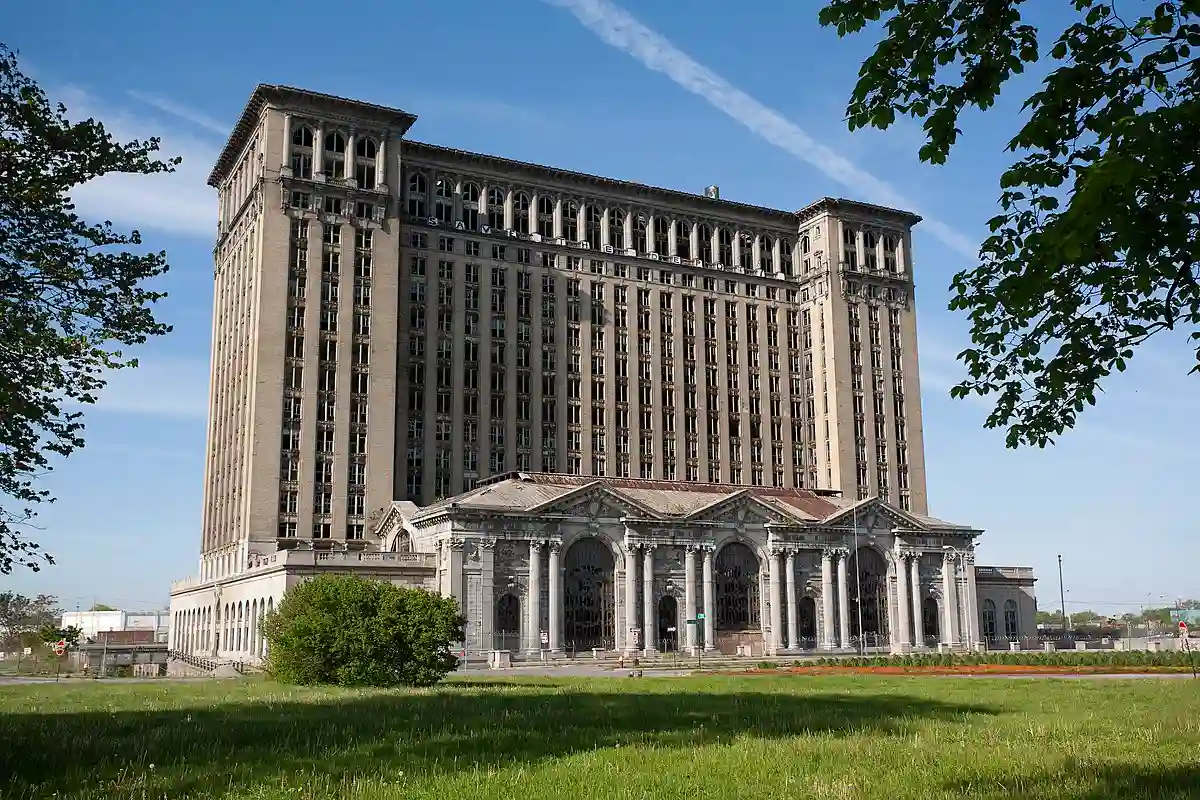 The abandoned Michigan Central Train Station, as seen from Roosevelt Park in Detroit. Note the "Save the Depot" sign on the top of the building. The abandoned Michigan Central Train Station, as seen from Roosevelt Park in Detroit. Note the "Save the Depot" sign on the top of the building.