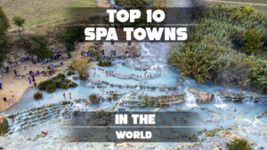 Scenic view of a luxury spa town with hot springs and mountain backdrop.