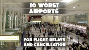 Crowded airport terminal with delayed flight boards.