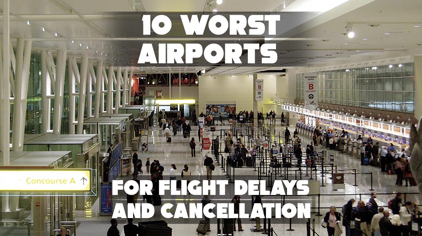 Crowded airport terminal with delayed flight boards.