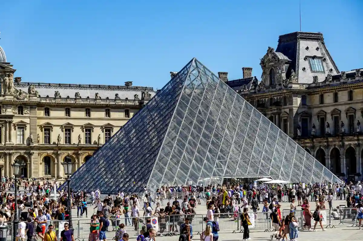 People Walking Beside the Louvre Pyramid People Walking Beside the Louvre Pyramid