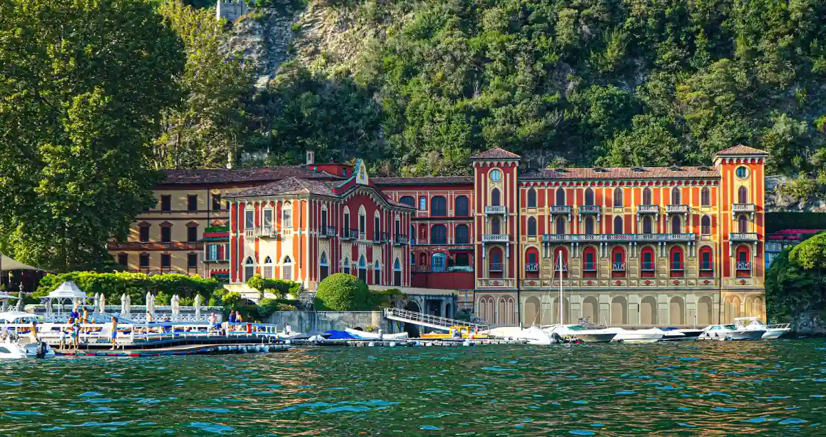 The grand Villa d'Este overlooking Lake Como, surrounded by lush gardens and offering exquisite views. The grand Villa d'Este overlooking Lake Como, surrounded by lush gardens and offering exquisite views.