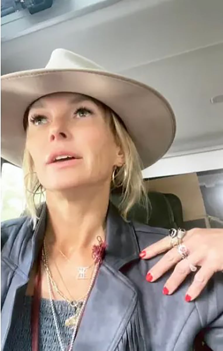 Kelley Wolf stands outside her Utah home with police during Instagram Live stream. Kelley Wolf stands outside her Utah home with police during Instagram Live stream.