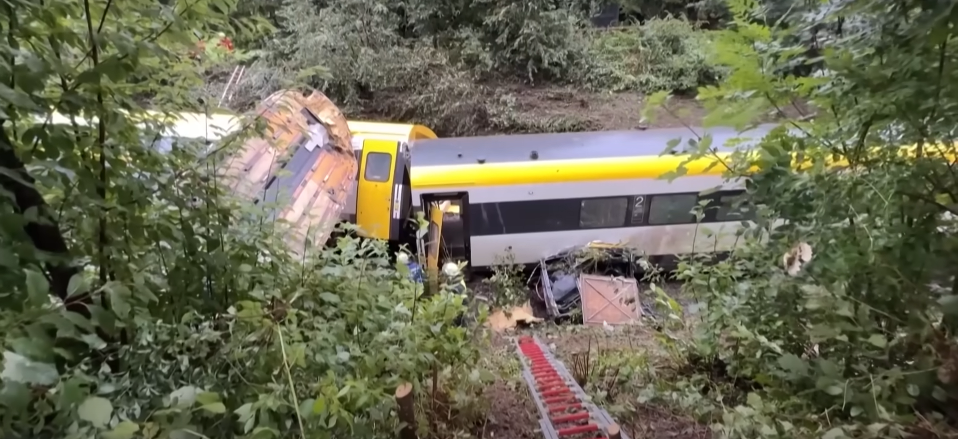 At least three killed after train derails & overturns with passengers left trapped in Germany At least three killed after train derails & overturns with passengers left trapped in Germany