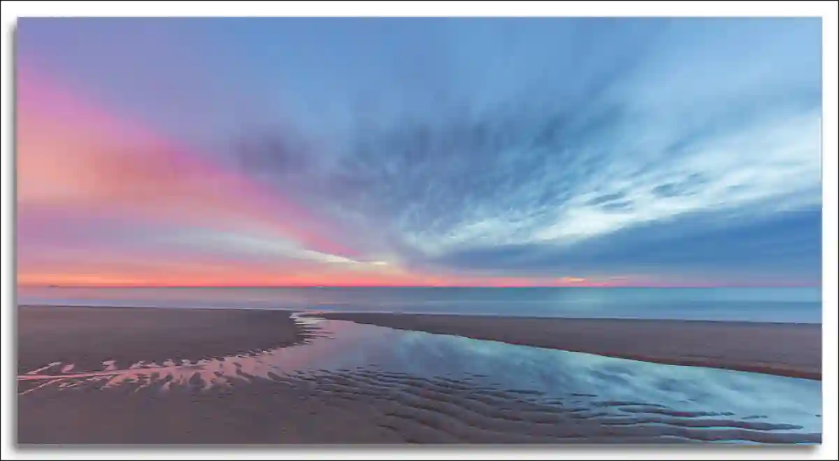 A serene sunrise over the Atlantic Ocean at the Jersey Shore, with soft golden light reflecting on the calm waters. A serene sunrise over the Atlantic Ocean at the Jersey Shore, with soft golden light reflecting on the calm waters.