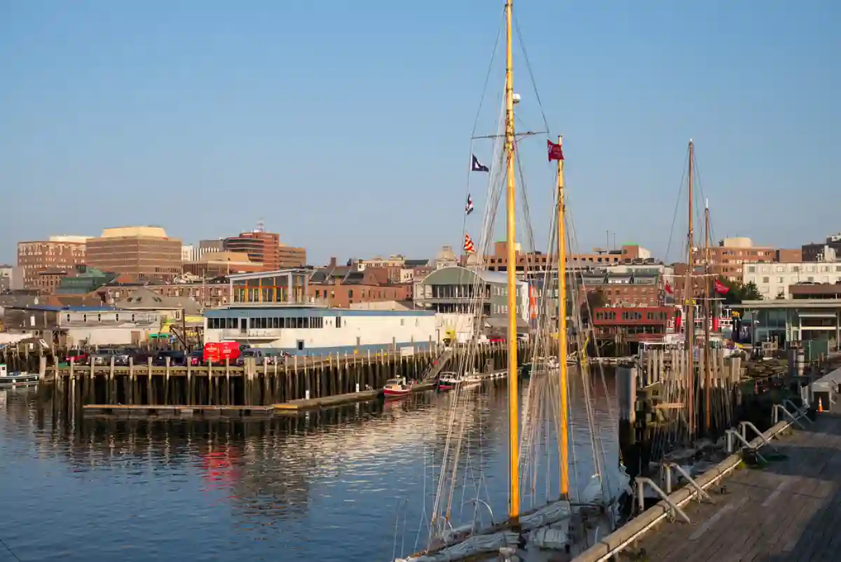 The bustling Old Port waterfront, with its historic buildings, shops, and boats docked along the harbor. The bustling Old Port waterfront, with its historic buildings, shops, and boats docked along the harbor.