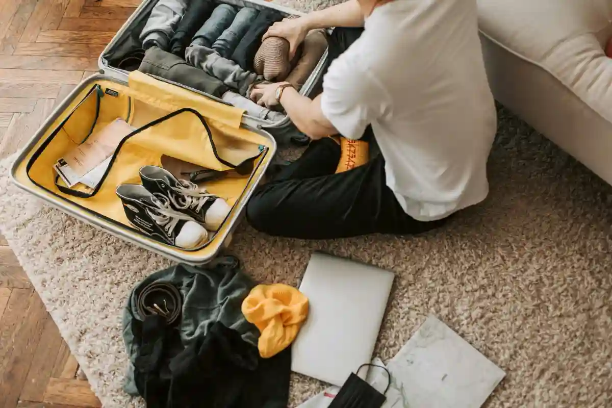 Packing essentials for first-time flyers, including travel-sized toiletries, clothing, and important documents. Packing essentials for first-time flyers, including travel-sized toiletries, clothing, and important documents.