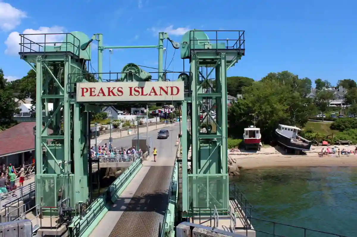 A ferry departing from Portland harbor, heading toward Peaks Island on a bright sunny day. A ferry departing from Portland harbor, heading toward Peaks Island on a bright sunny day.
