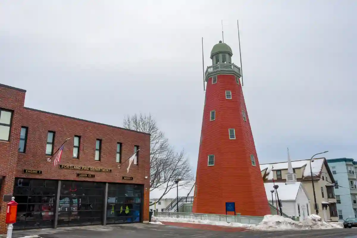 The Portland Observatory standing tall against the blue sky, offering panoramic views of the city and harbor. The Portland Observatory standing tall against the blue sky, offering panoramic views of the city and harbor.