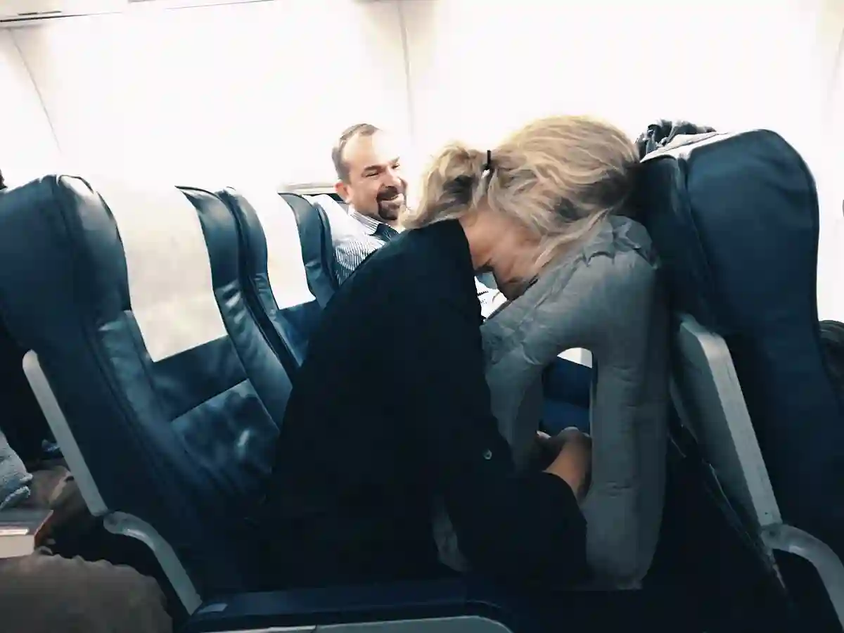 A Siesta travel pillow designed for comfort, resting on a seat, perfect for taking naps during long trips. A Siesta travel pillow designed for comfort, resting on a seat, perfect for taking naps during long trips.