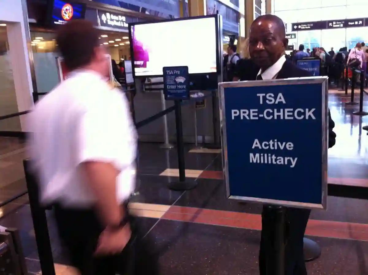 A passenger walking through the TSA Pre-Check security line at National Airport (DCA), with a streamlined, efficient process for faster screening. A passenger walking through the TSA Pre-Check security line at National Airport (DCA), with a streamlined, efficient process for faster screening.
