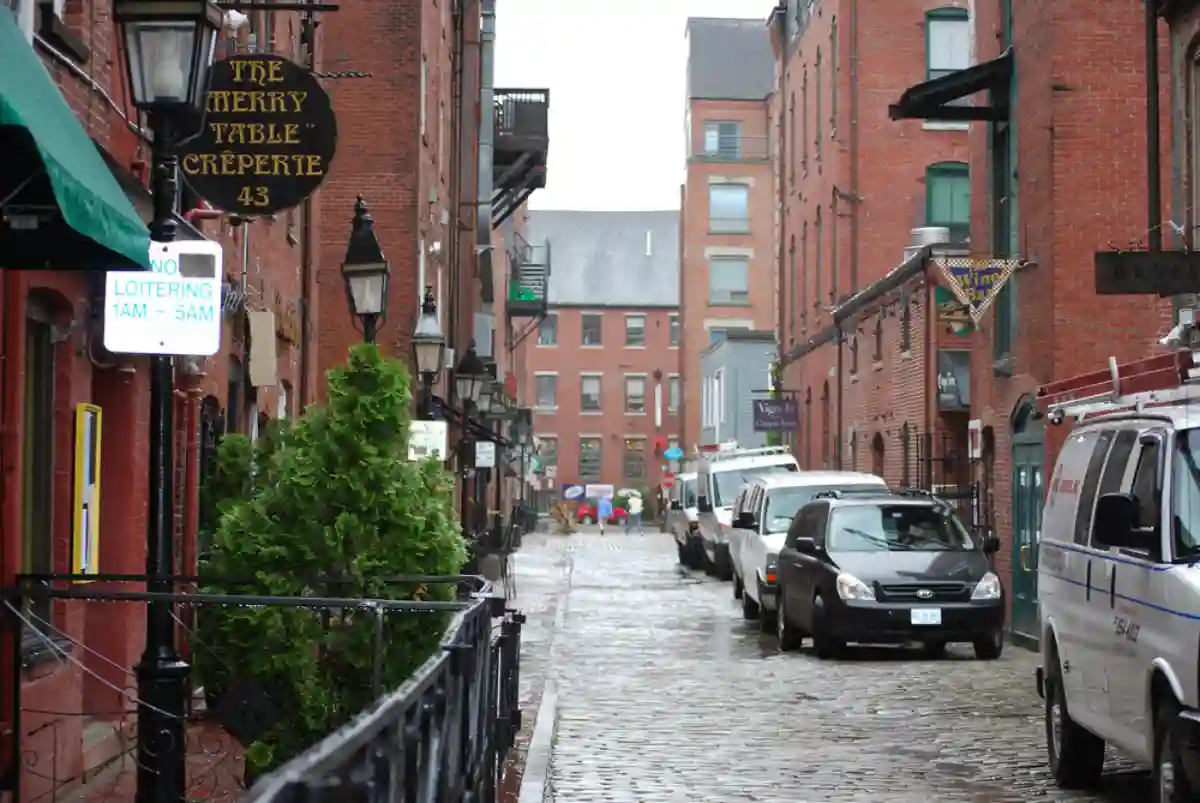 Cobblestone streets of the Old Port District lined with historic brick buildings and vibrant shops Cobblestone streets of the Old Port District lined with historic brick buildings and vibrant shops