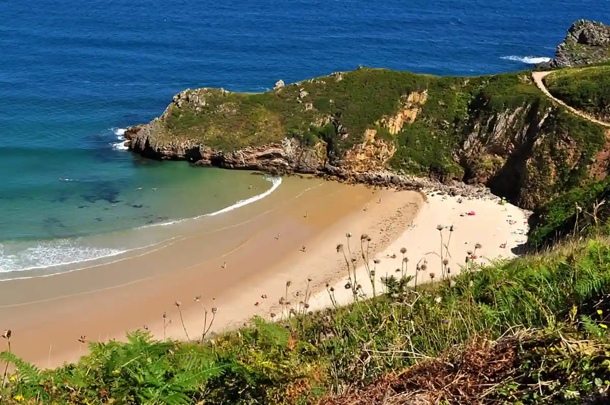 Playa de Torimbia is a breathtaking natural beach in Asturias, known for its golden sand, clear waters, and untouched surroundings, perfect for a peaceful retreat Playa de Torimbia is a breathtaking natural beach in Asturias, known for its golden sand, clear waters, and untouched surroundings, perfect for a peaceful retreat